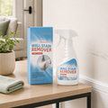 Wall Scuff Remover Spray box and bottle near a light wall scuff in an apartment entryway