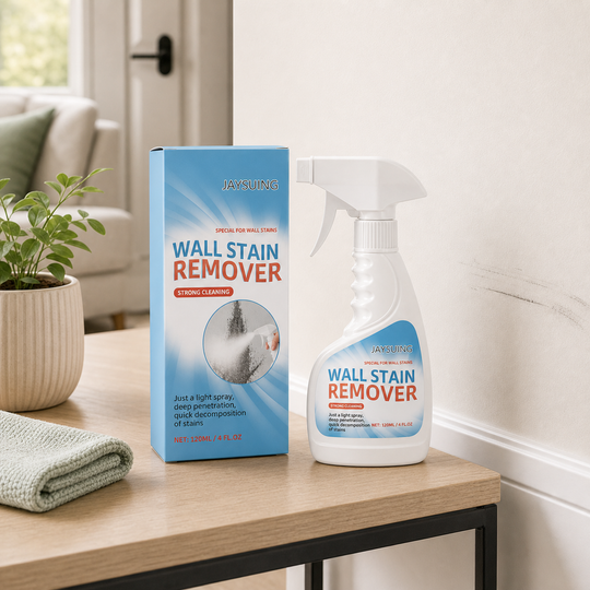 Wall Scuff Remover Spray box and bottle near a light wall scuff in an apartment entryway